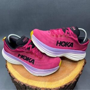 Hoka One One Women’s Pink Running Shoes with Purple and Yellow Accents